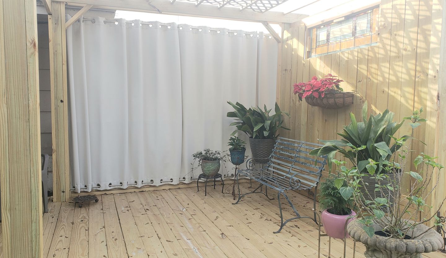 Customer photo review of Top & Bottom Grommet Windproof Outdoor Curtains for Patio 1 Panel