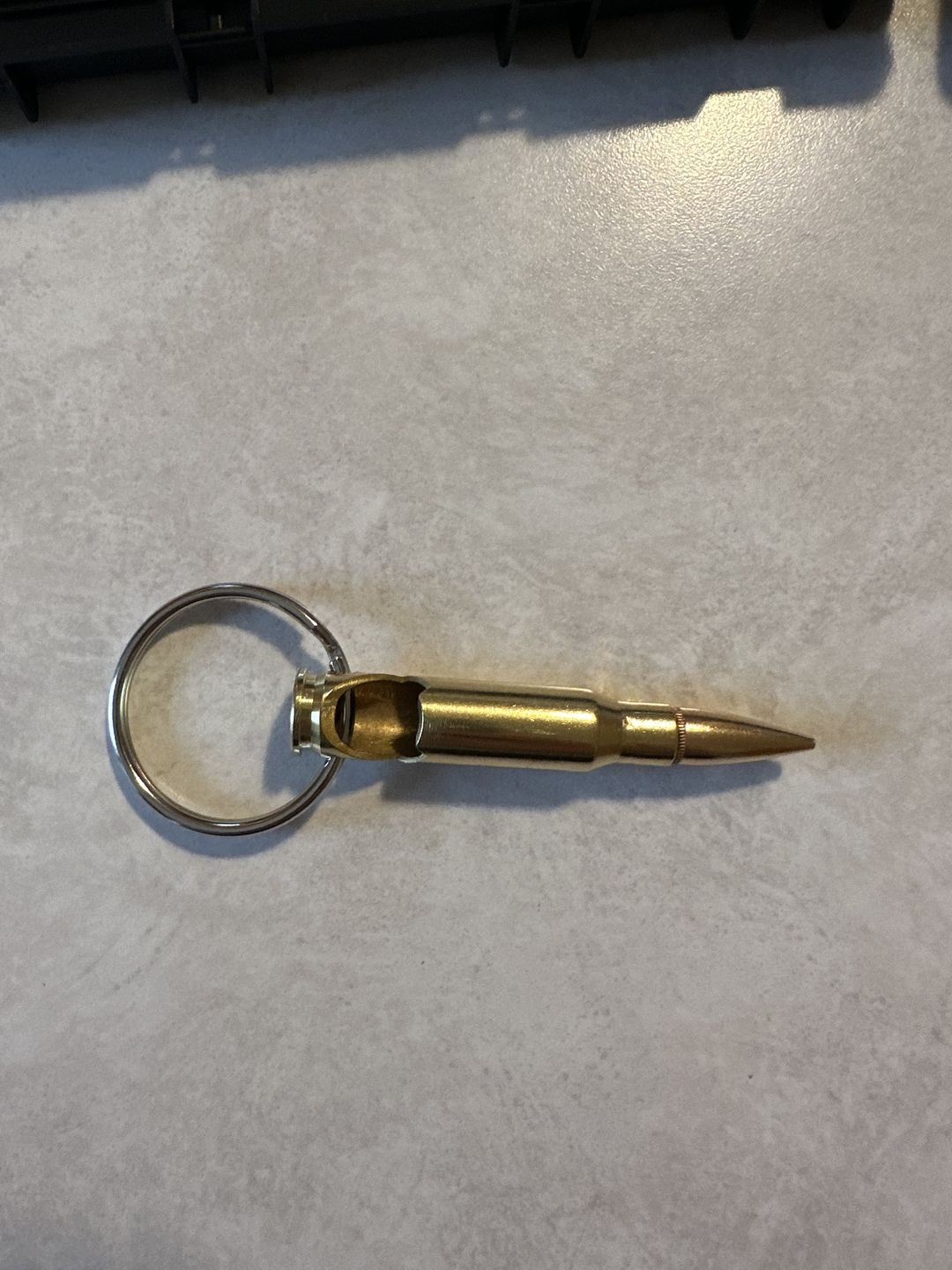 Customer photo review of .308 Real Bullet Keychain Bottle Opener - Made in the USA