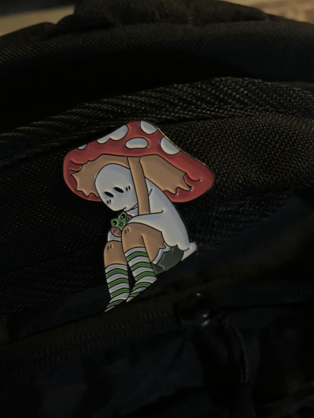 Customer photo review of Red Mushroom Ghost Enamel Pin