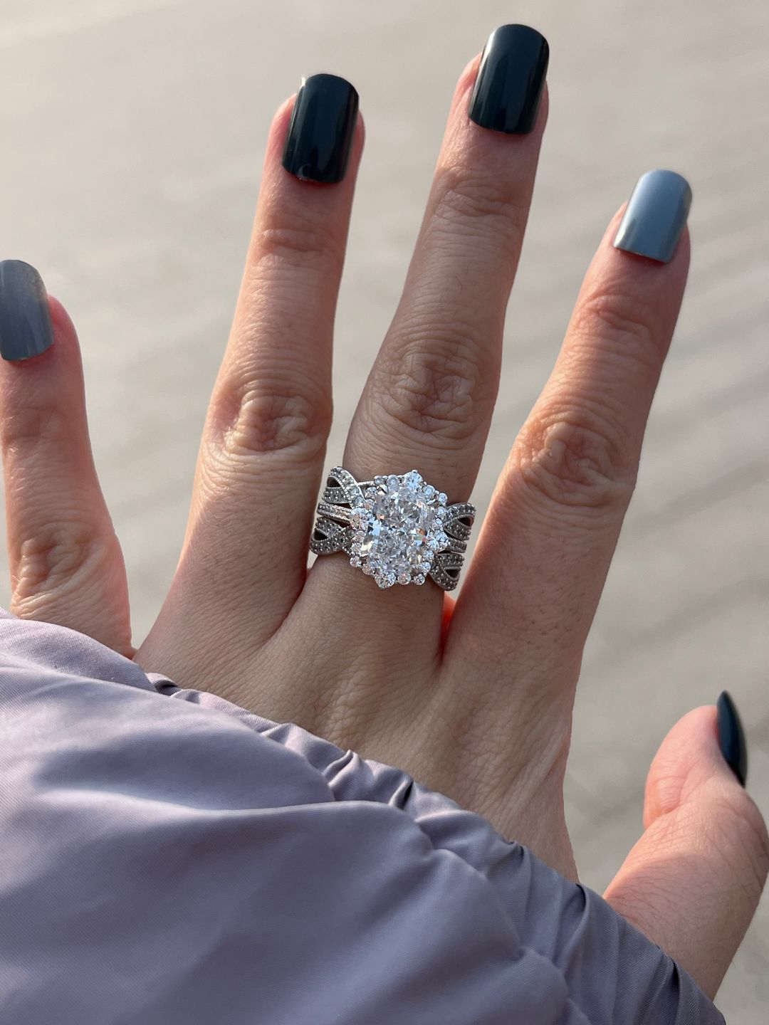 Customer photo review of S925 3.0Ct Radiant Cut Black Stone/White Stone Halo Insert Wedding Ring Set For Women In Sterling Silver