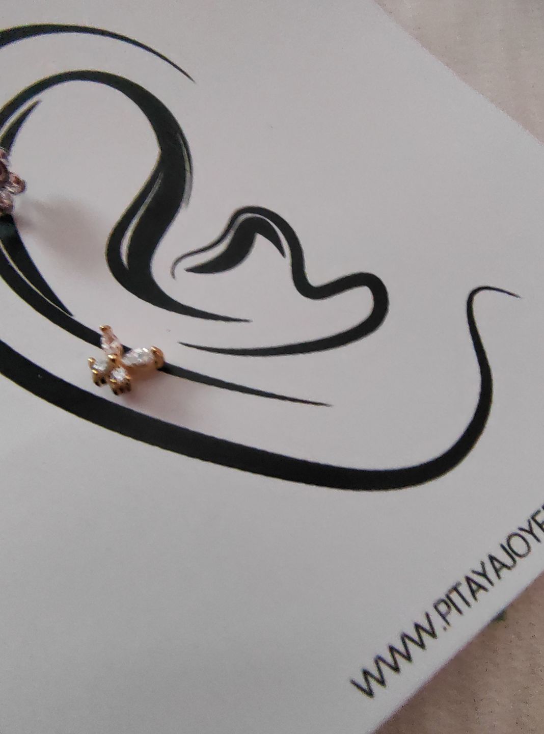 Customer photo review of Piercing de Mariposa