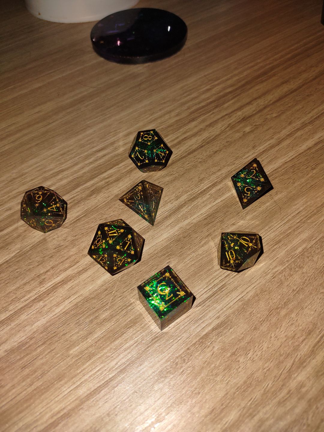 Customer photo review of URWizards D&D Resin Dark Glitter Engraved Dice Set Cleric Style