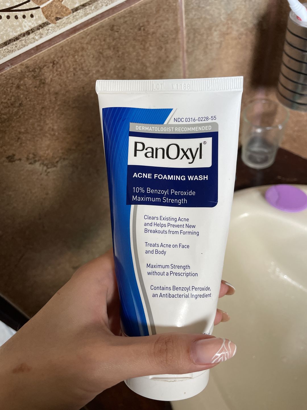 Customer photo review of PanOxyl Maximum Strength Antimicrobial Acne Foaming Wash for Face