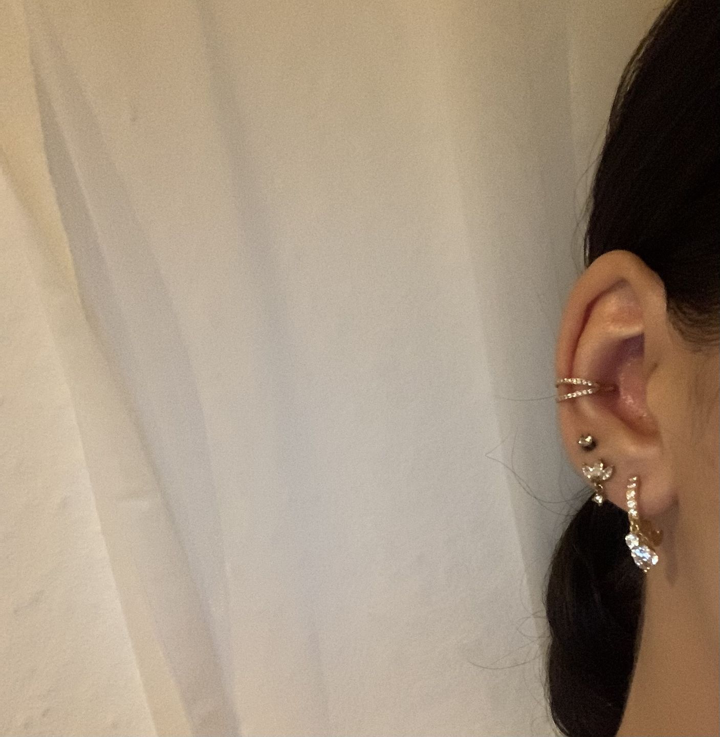 Customer photo review of Double Clicker Piercing | Titan