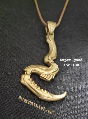 Customer photo review of Praying Mantis Claw Pendant