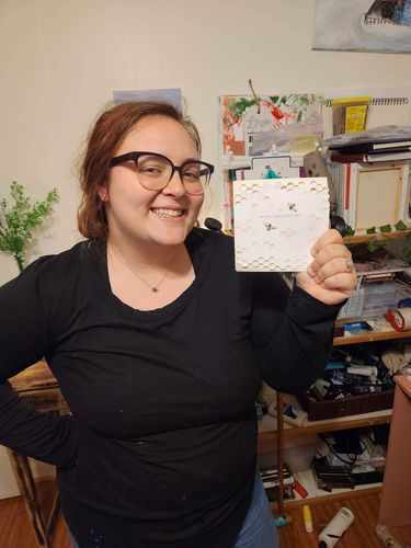 Customer photo review of Original Adopt a Bee Necklace
