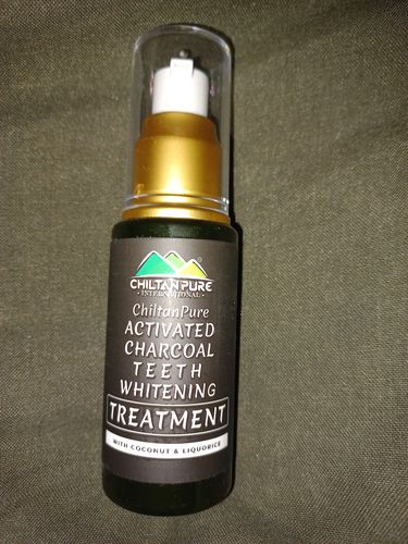 Customer photo review of Activated Charcoal Teeth Whitening Treatment - Whitens Teeth Naturally, Kills Cavity causing Bacteria & Eliminates Bad Breath