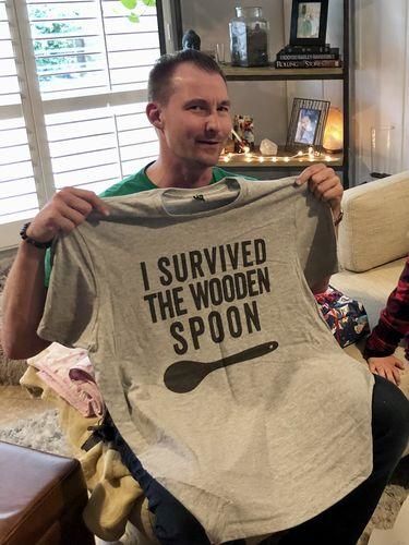 Customer photo review of I Survived The Wooden Spoon T-Shirt