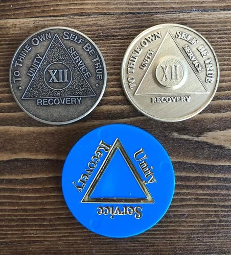 Customer photo review of Recovery Mint 12 Year Bronze AA Meeting Chips - Twelve Year Sobriety Coins/Tokens