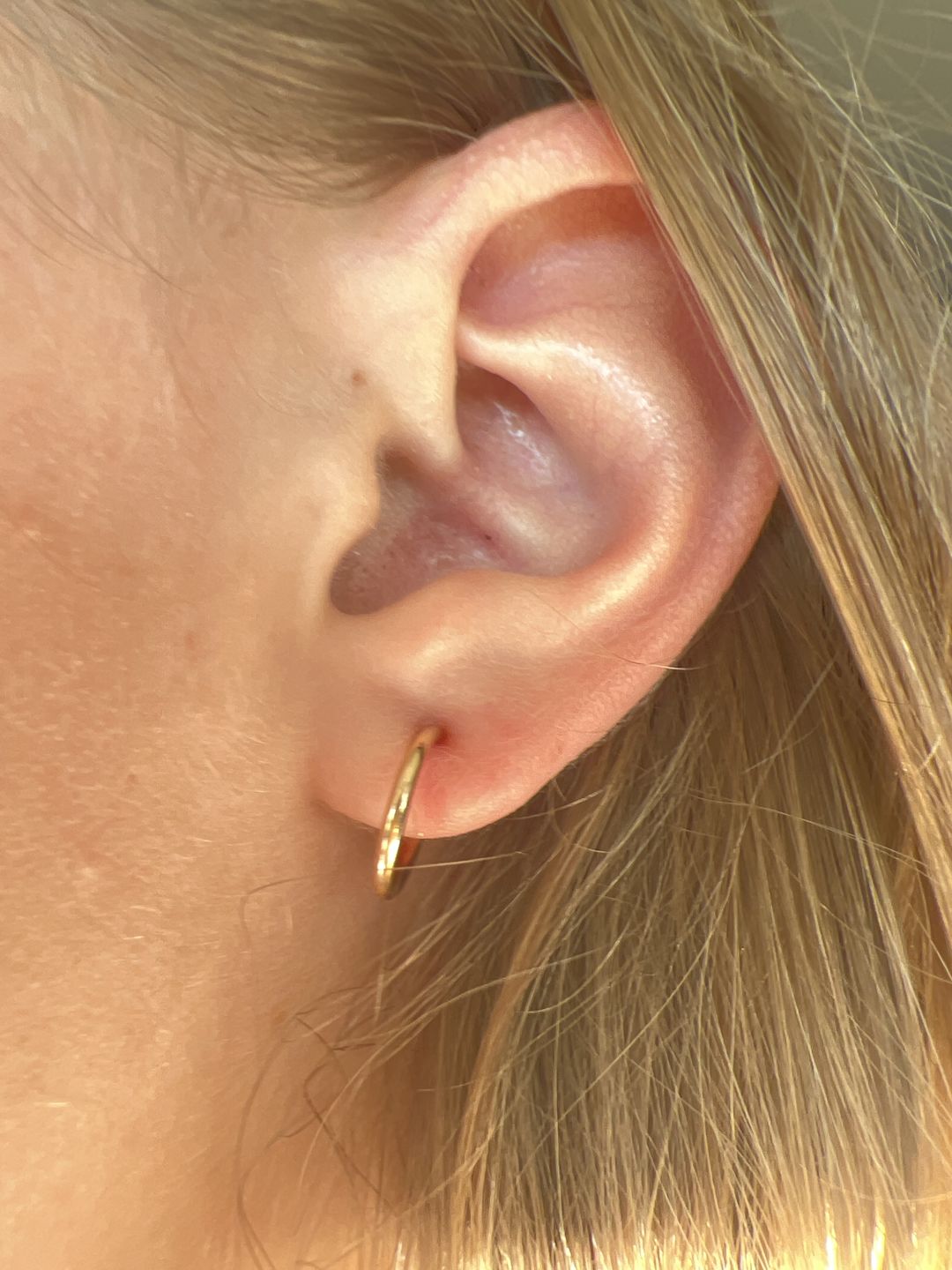 Customer photo review of Tiny Hoop Clip On Earrings in Gold