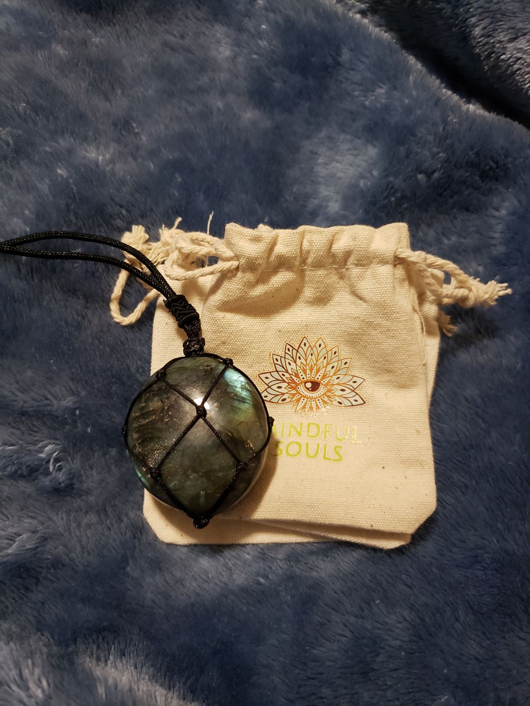 Customer photo review of Dragon's Heart Labradorite Necklace