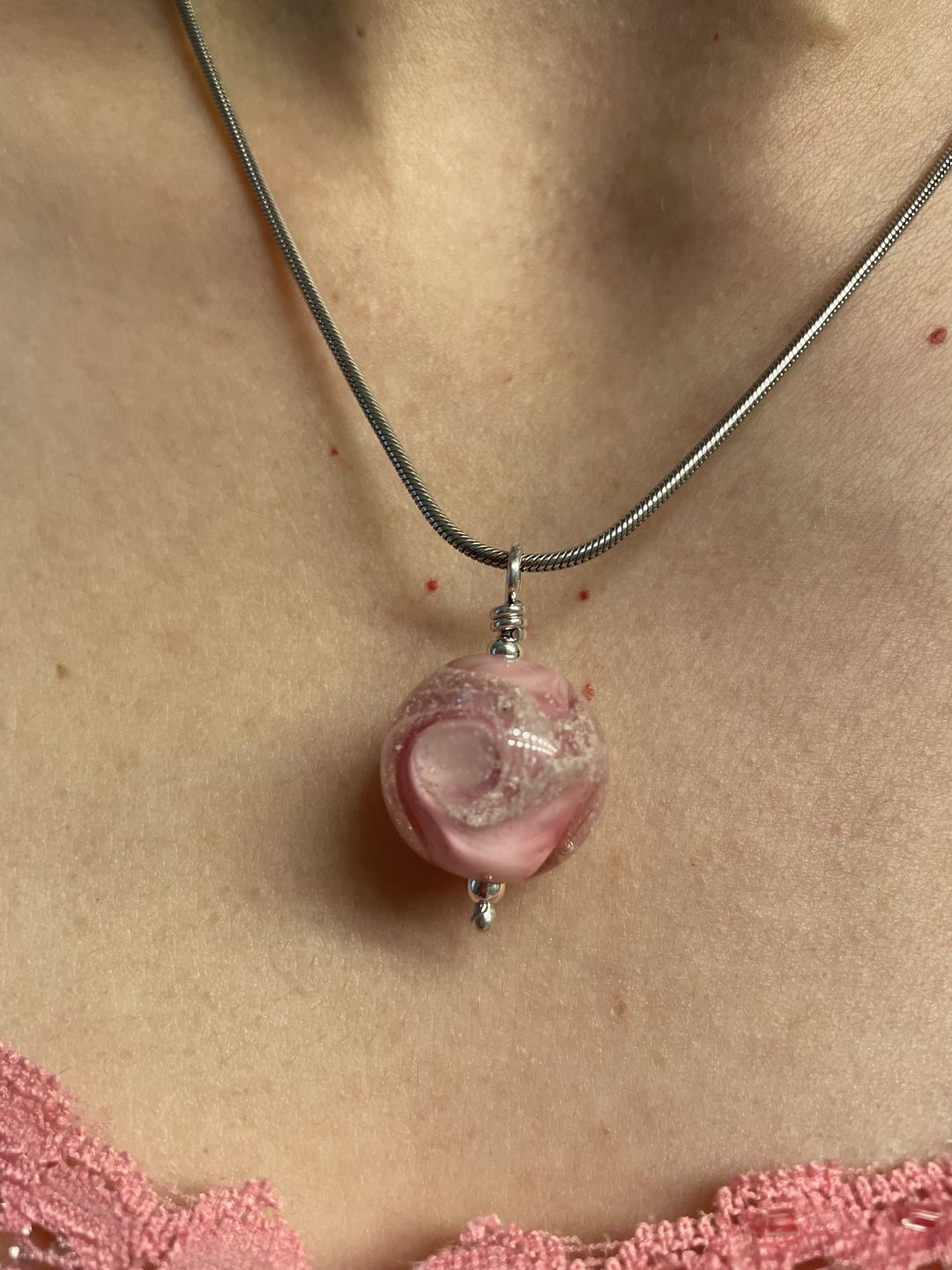 Customer photo review of Cosmic Swirl Memorial Pendant