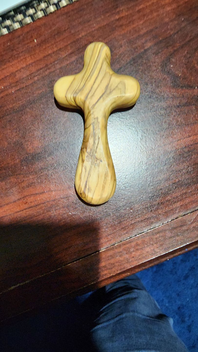 Customer photo review of Olive Wood Comfort Cross (Handheld)