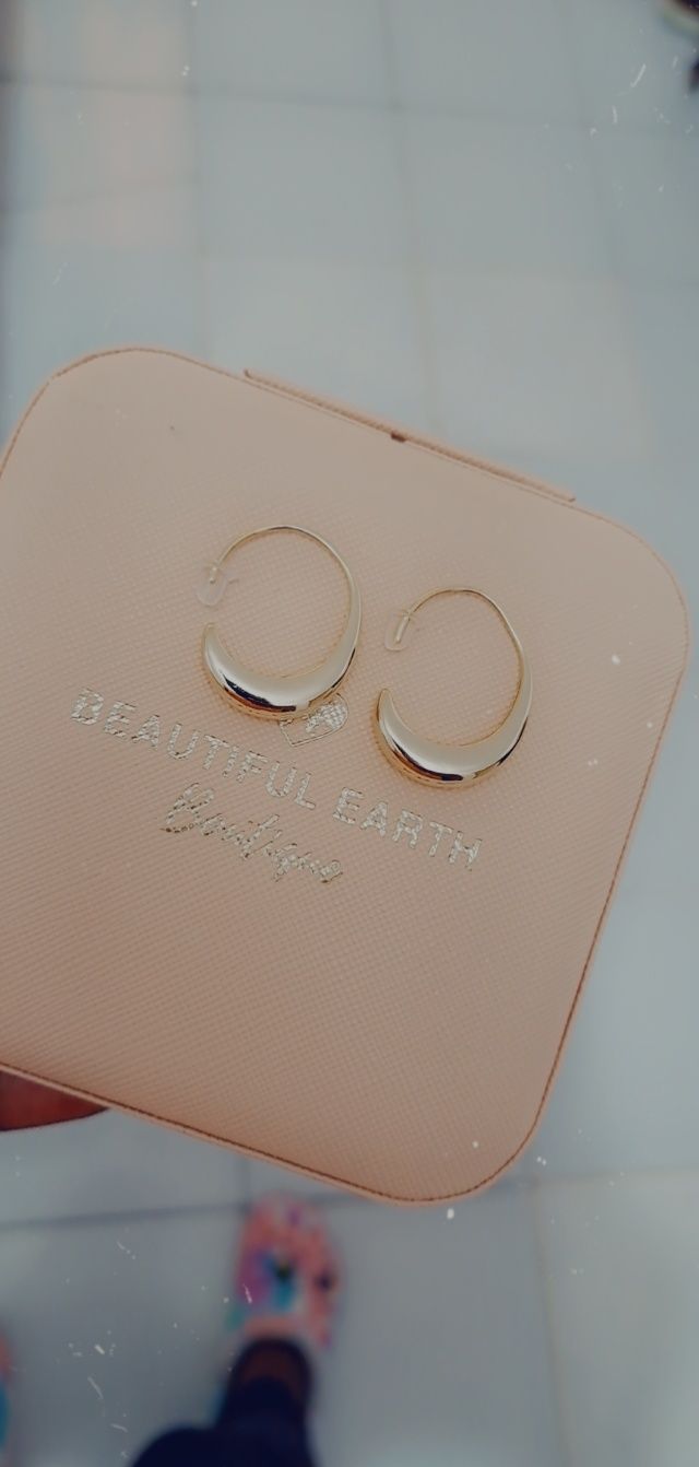 Customer photo review of Classic Drop Hoop Earrings