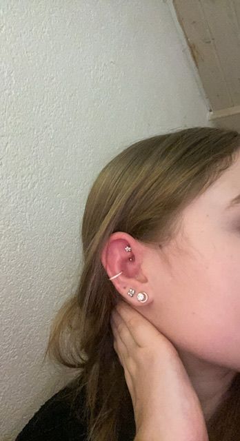 Customer photo review of Conch Clicker | Titan Piercing