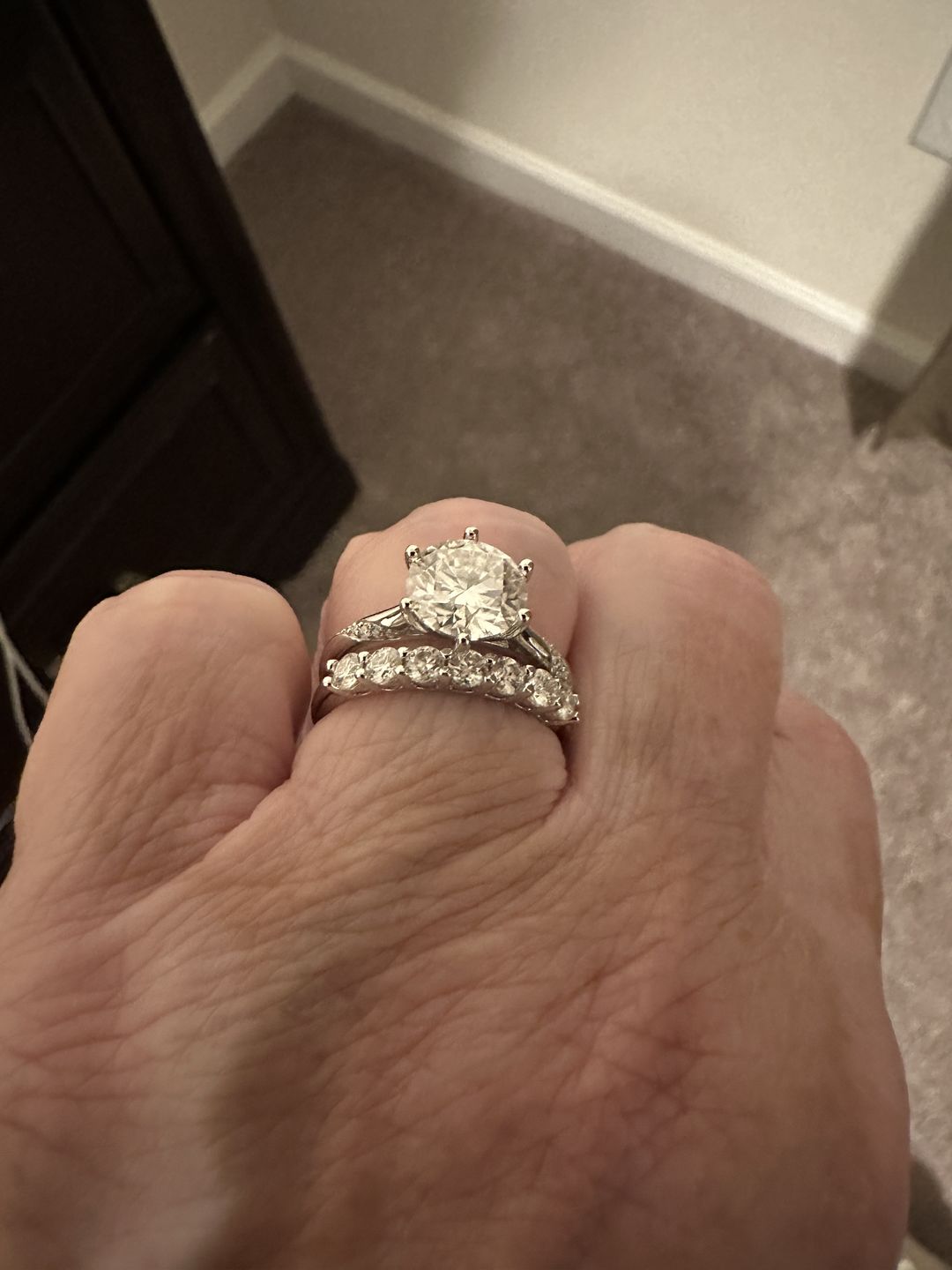 Customer photo review of Round Moissanite Sterling Silver Wedding Band Stackable Ring