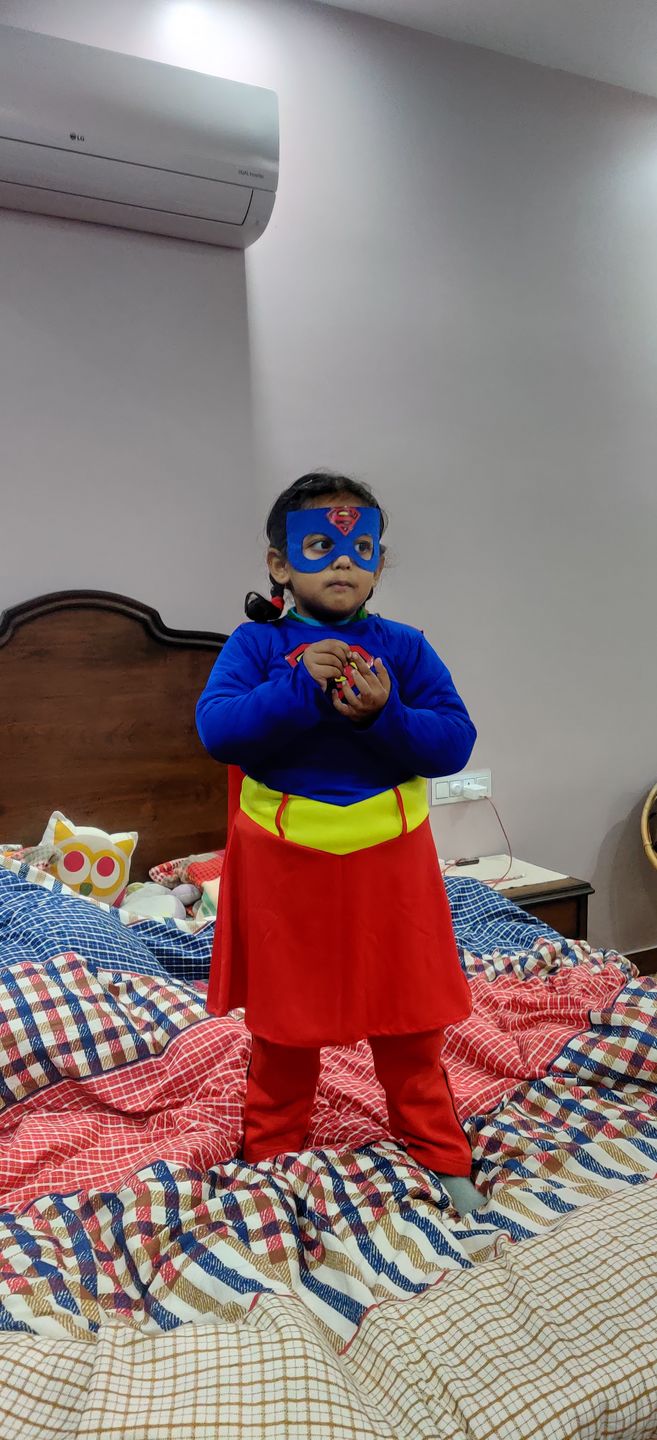 Customer photo review of Supergirl Dress with Cape and Stocking