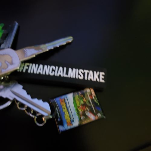 Customer photo review of Financial Mistake Rubber Key Ring