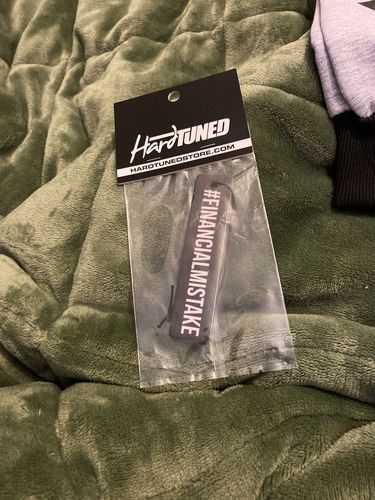 Customer photo review of Financial Mistake Air Freshener - New Car