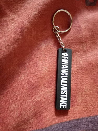 Customer photo review of Financial Mistake Rubber Key Ring