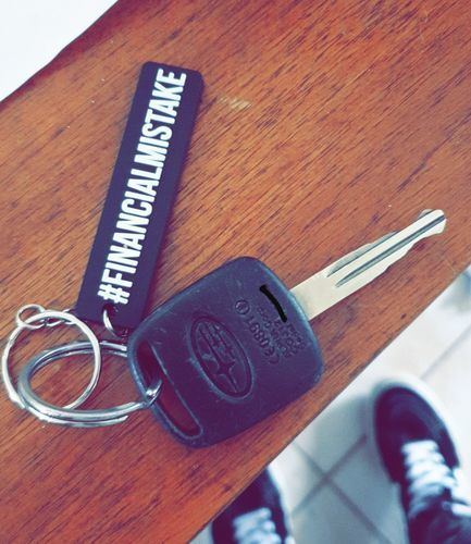 Customer photo review of Financial Mistake Rubber Key Ring