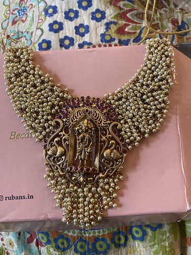 Customer photo review of Rubans 24K Gold Plated Necklace Set With Pearls Ruby Stones And Goddess Motifs.