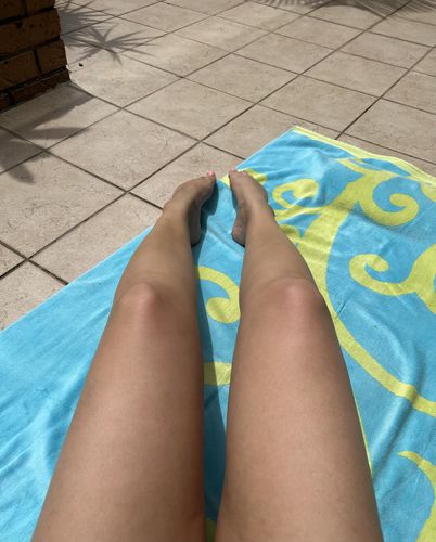 Customer photo review of Tan Boosting Duo - Sun Tanning Lotion + Spray