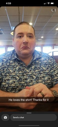 Customer photo review of Shark Attack Everyday Polo