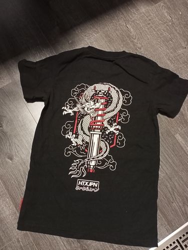 Customer photo review of Dragon Coilover Tattoo Band Tee