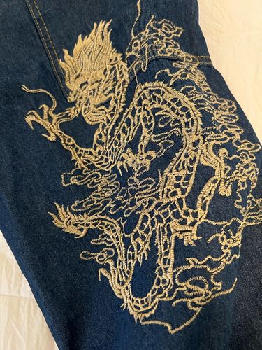Customer photo review of Dragon Embroidered Denim Jeans