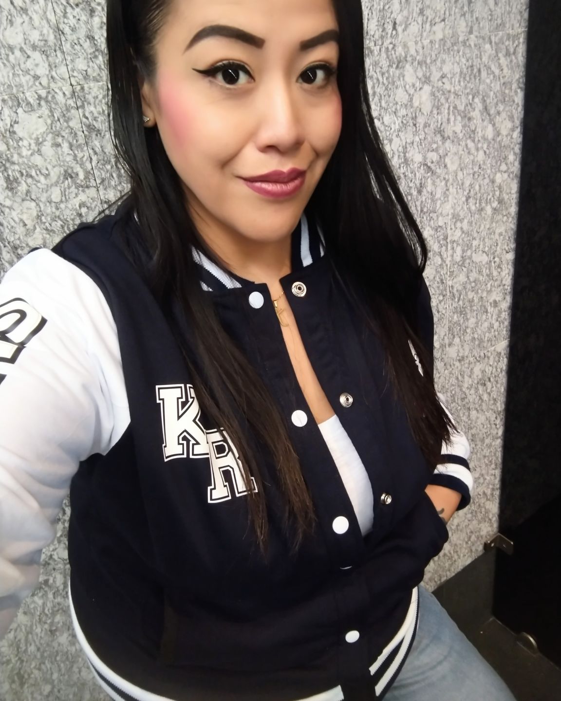 Customer photo review of Chamarra Universitaria Snoopy