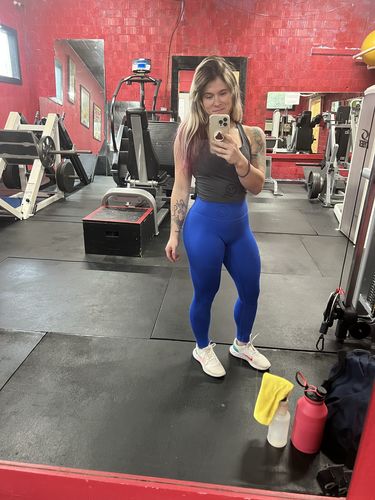 Customer photo review of Salty Savage Ladies Skull Print Racerback Longline Sports Bra Crop Tank | Dark Gray