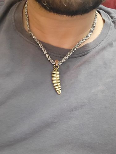 Customer photo review of Rattlesnake Tail Pendant