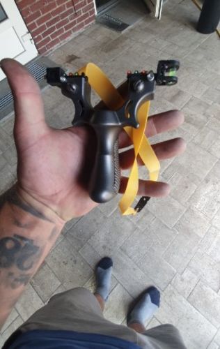 Customer photo review of Estilingue Laser Tático Power™ 2.0 - Precisão e Potência Máxima (50% OFF)