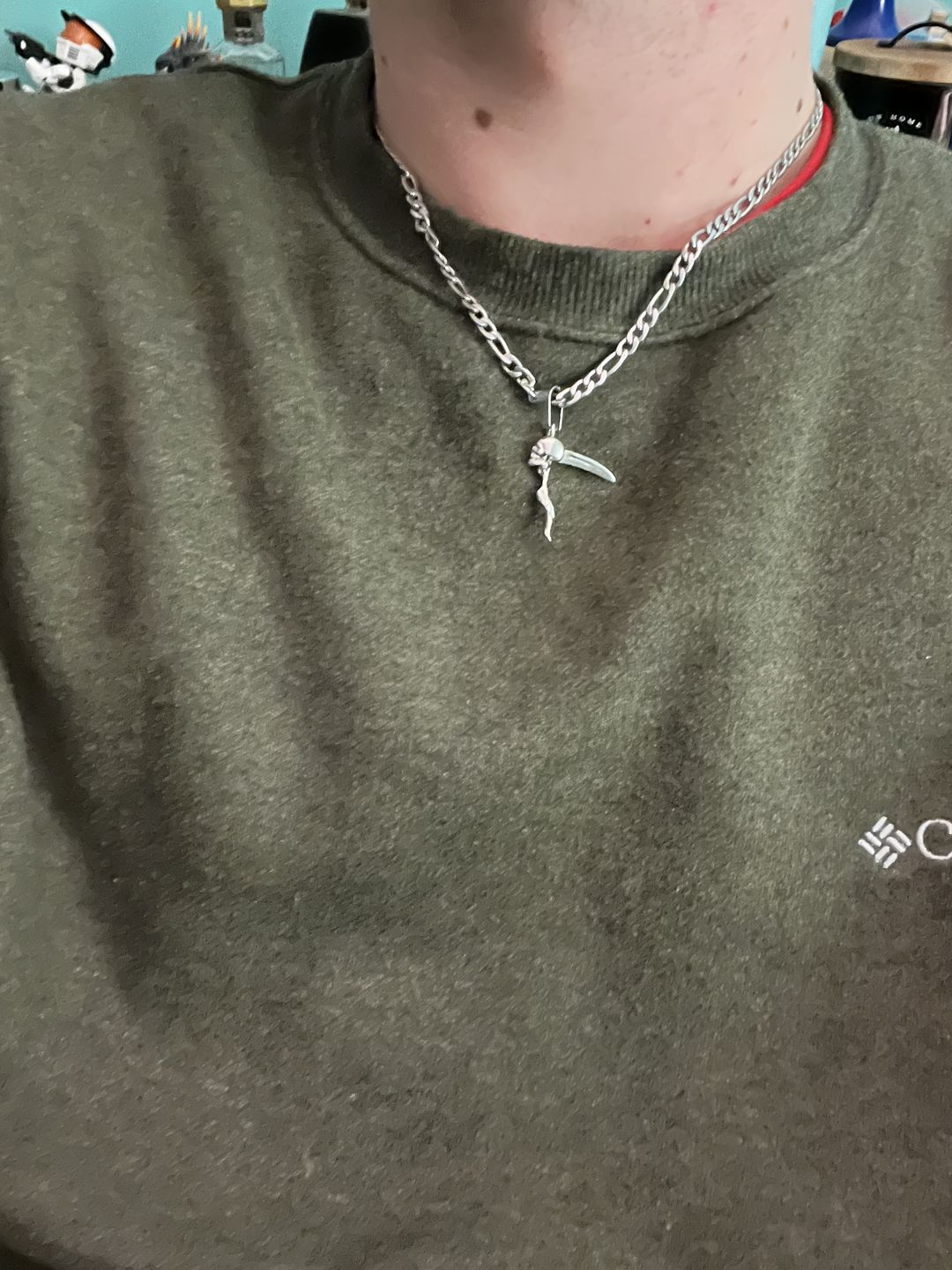 Customer photo review of SCYTHE SKULL PENDANT