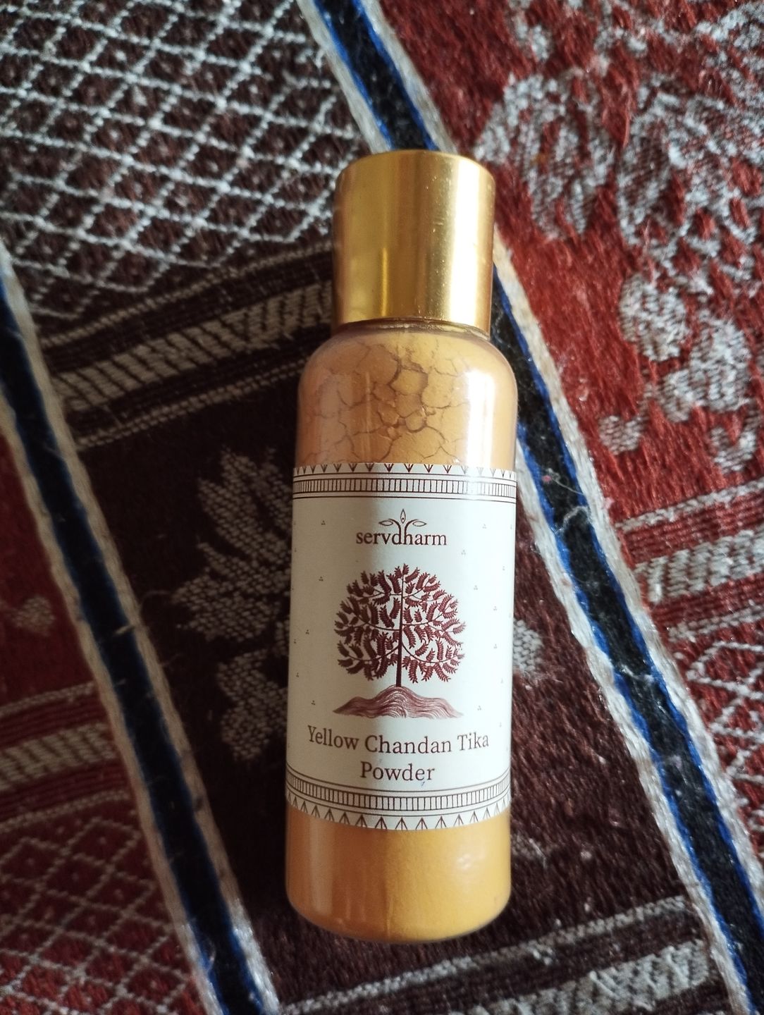 Customer photo review of Pure Yellow/Pila Chandan Tilak Powder for Pooja (50 grams)