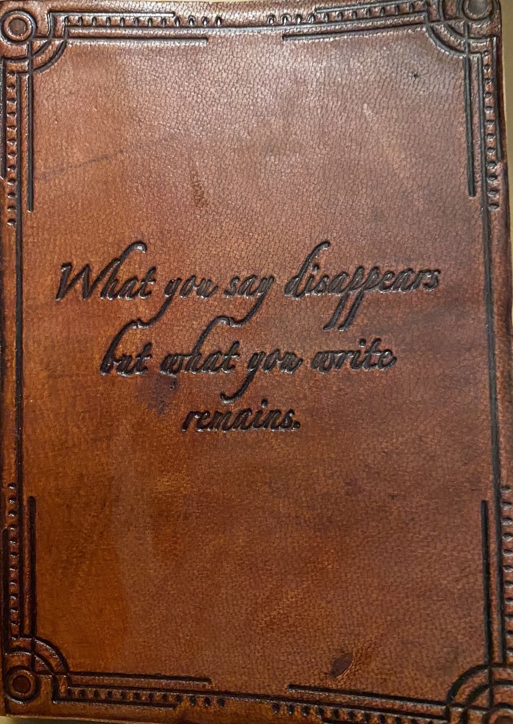 Customer photo review of What You Write Remains Quote Leather Journal - 7x5