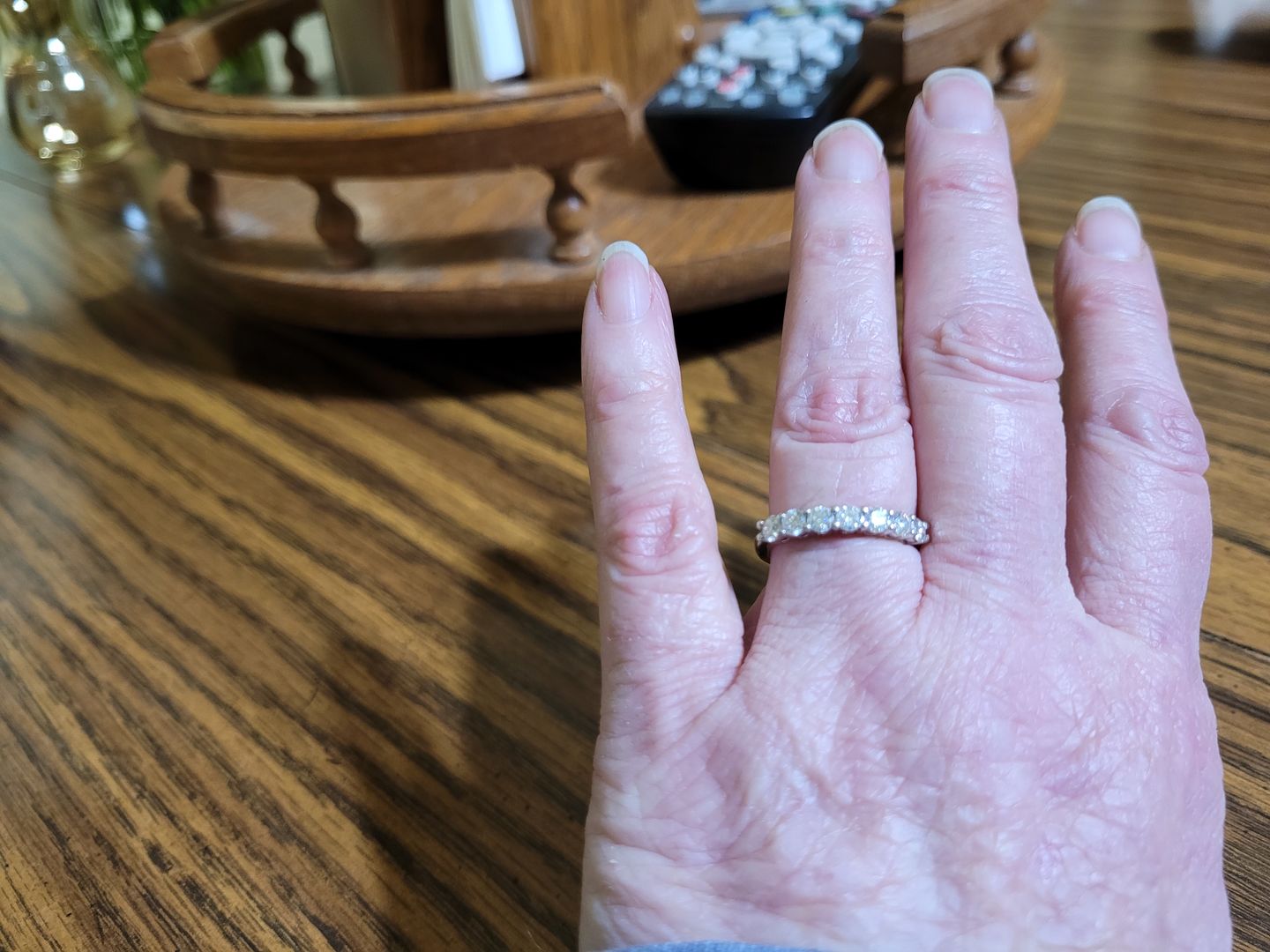 Customer photo review of Round Moissanite Sterling Silver Wedding Band Stackable Ring