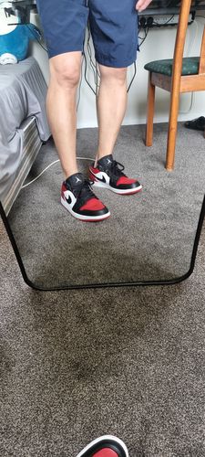 Customer photo review of Nike Air Jordan 1 Low 'Bred Toe'