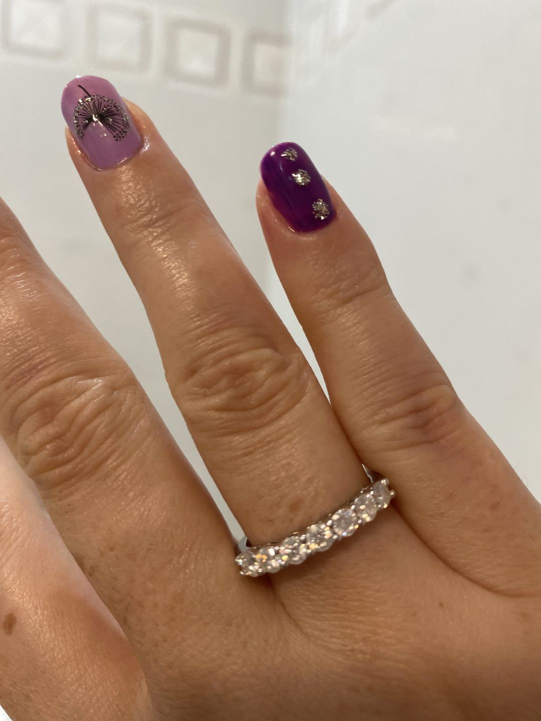 Customer photo review of Round Moissanite Sterling Silver Wedding Band Stackable Ring