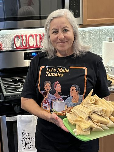 Customer photo review of Let's Make Tamales OG Familia Tee- Making Masa And Memories
