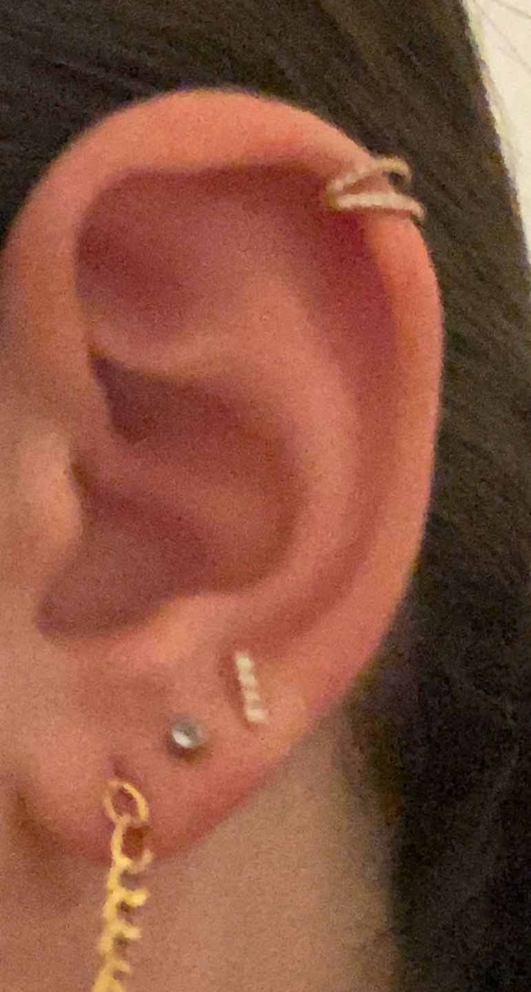 Customer photo review of Double Clicker Piercing | Titan