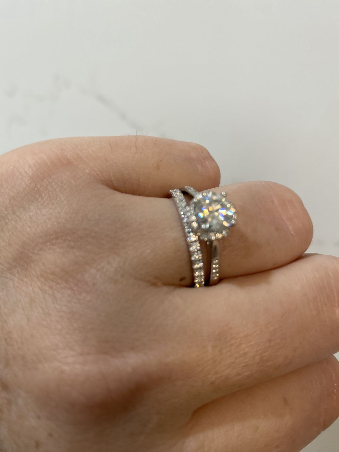 Customer photo review of Moissanite Round Half Eternity Sterling Silver Wedding Band Stackable Ring