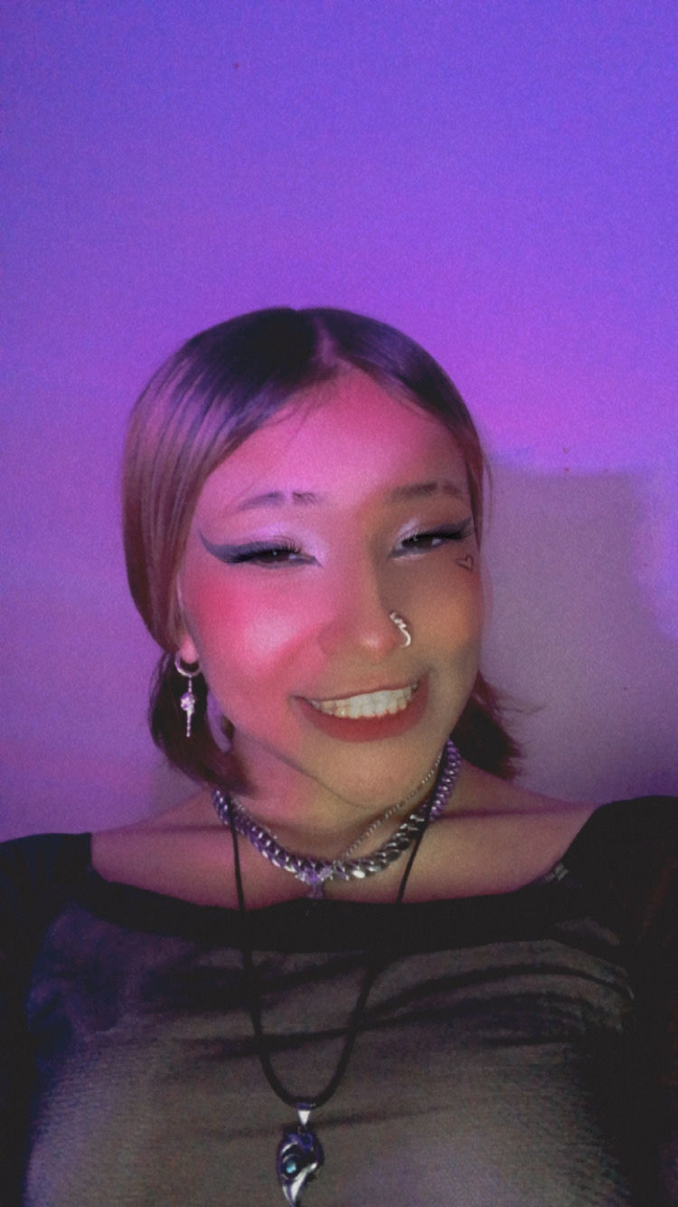 Customer photo review of DOWN YOUR THROAT EARRING
