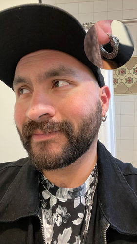 Customer photo review of Ouroboros Earrings