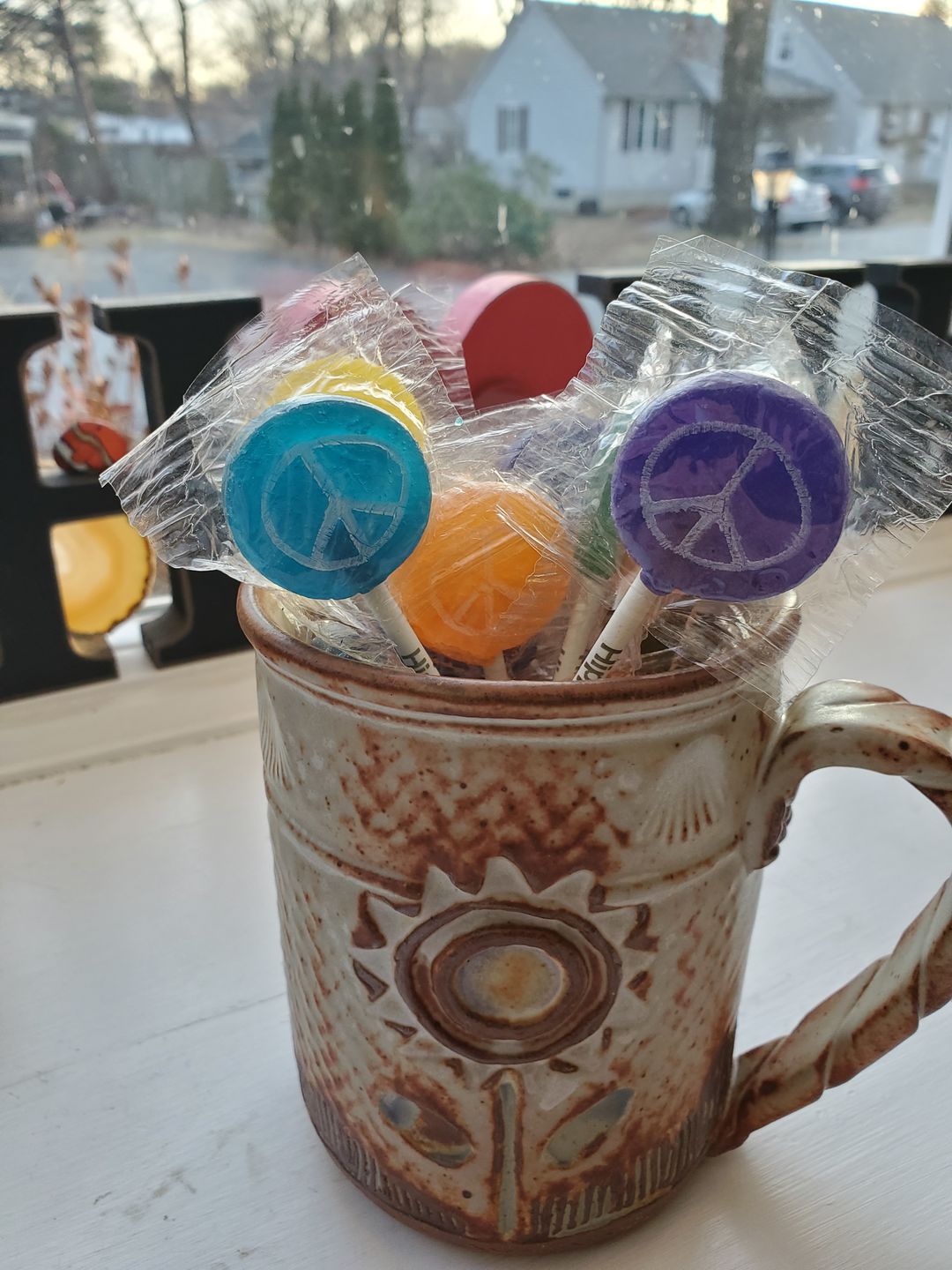 Customer photo review of Hippie Shop Peace Pop Lollipops
