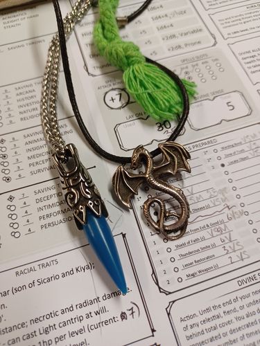 Customer photo review of The Beast's Fang Glow In The Dark Necklace