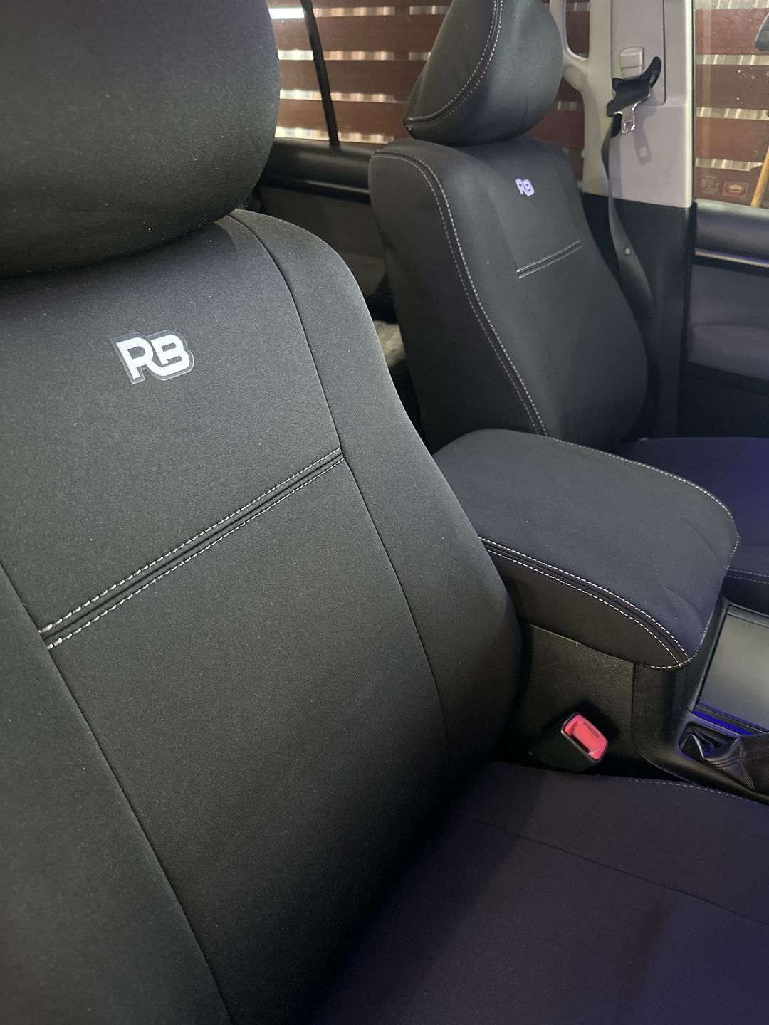 Customer photo review of Toyota Landcruiser 200 Series GX/GXL Neoprene Armrest Console Lid (In Stock)
