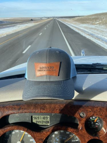 Customer photo review of Custom Leather Patch Trucker Hat - Richardson 112