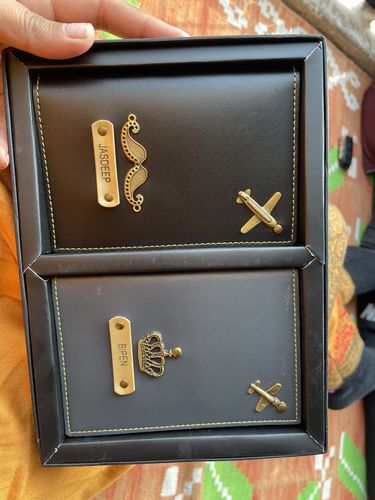 Customer photo review of Customized Passport Covers Combo With Name & Charm